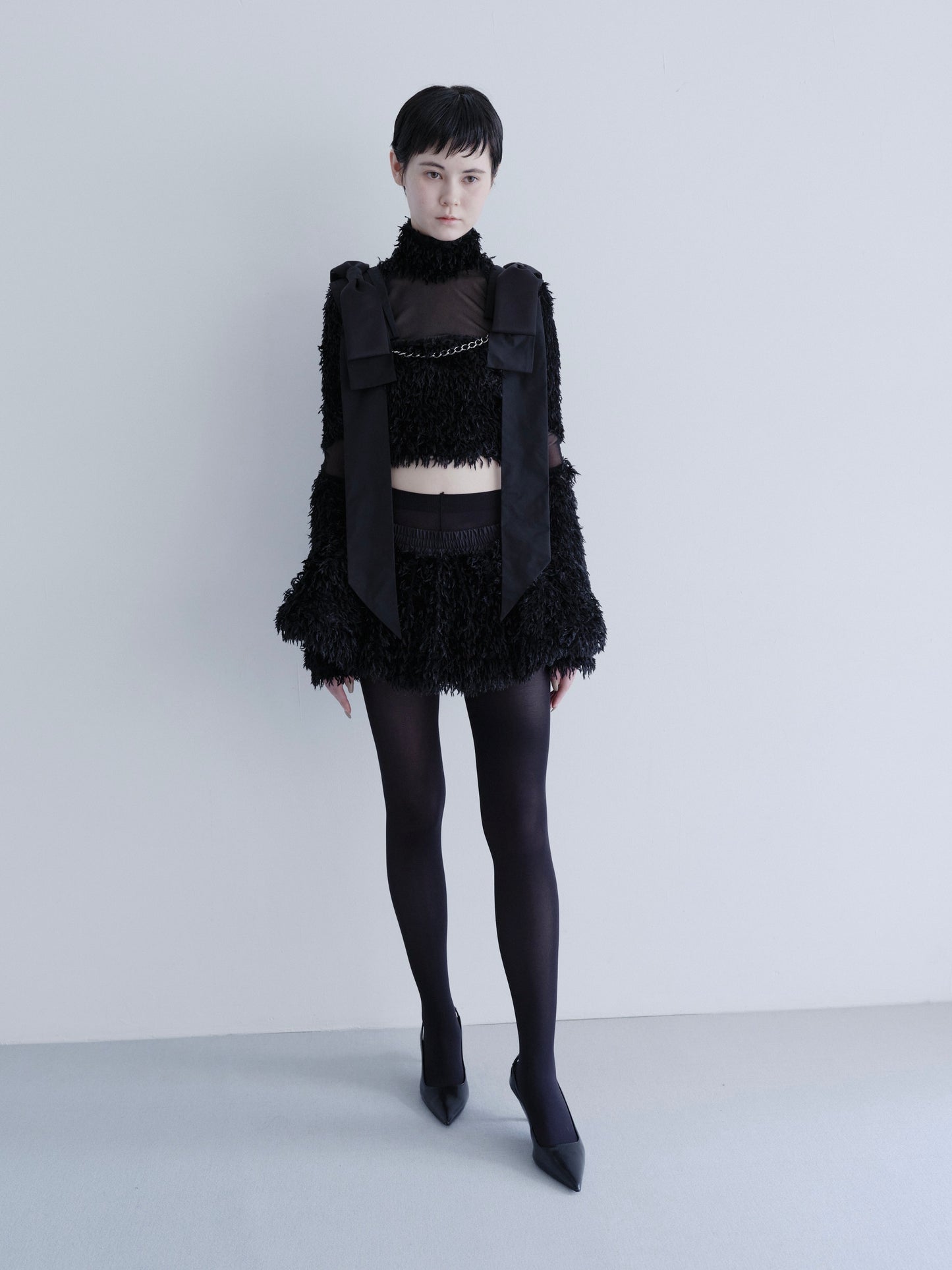 "HEAVENS" feather knit volume mini skirt
